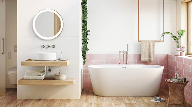 Scandinavian Bathroom Hero Image. Featuring a wide, open-space bathroom with a freestanding bath tub, wall hung oak shelves with a circular countertop basin and round, wall hung LED mirror.