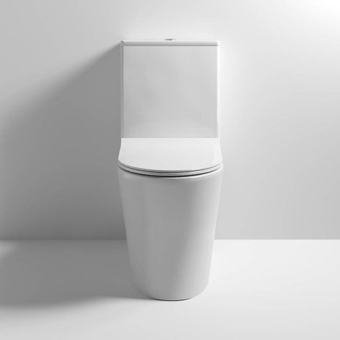 Nuie Freya Round Flush to Wall Pan, Cistern & Soft Close Seat - Unbeatable Bathrooms